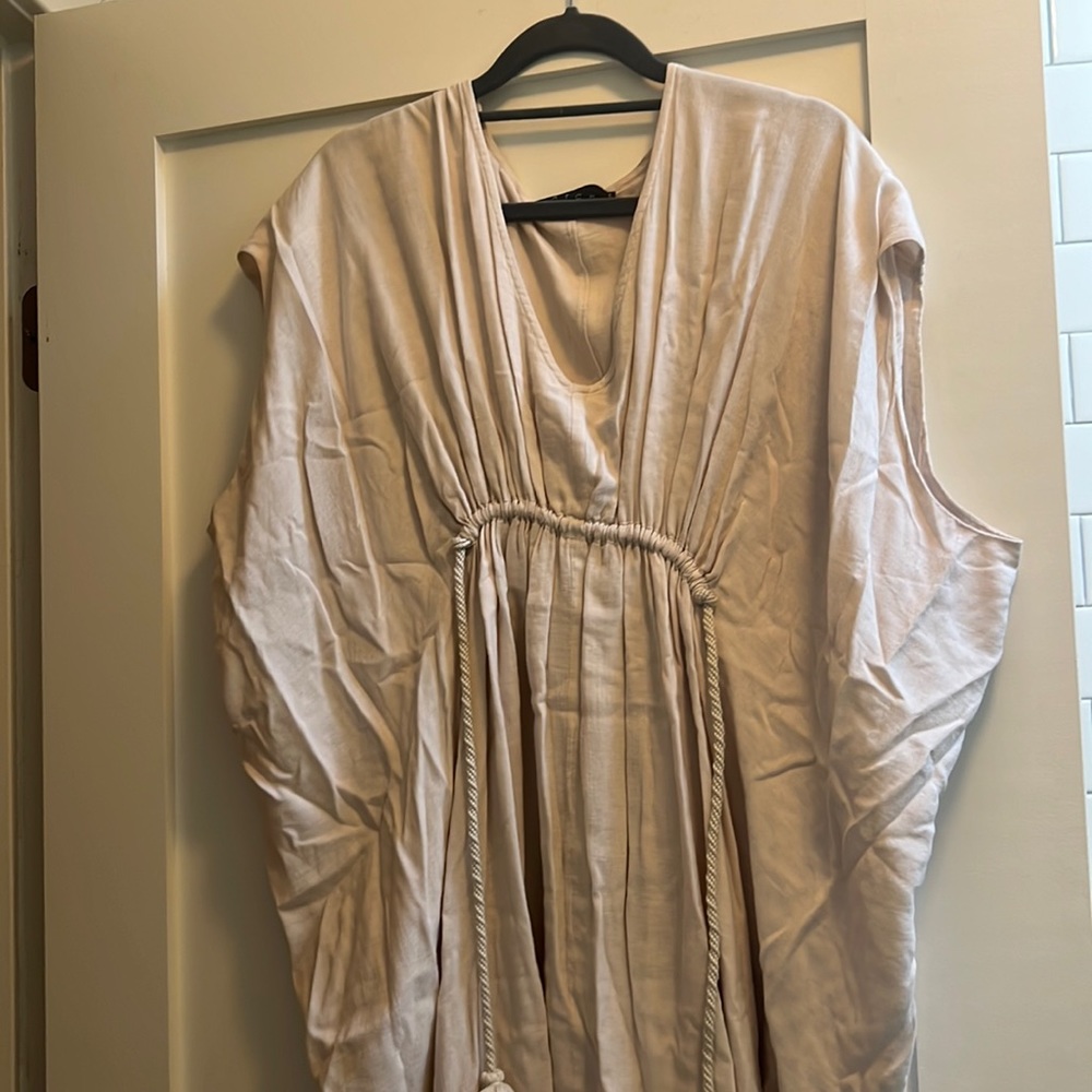 Hatch Grecian Maternity Dress. Off White with tie above belly.